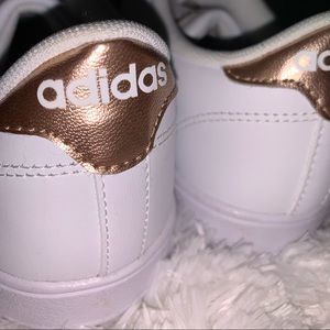 Adidas white with rose gold accent tennis shoes